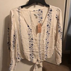White and blue top. Size medium